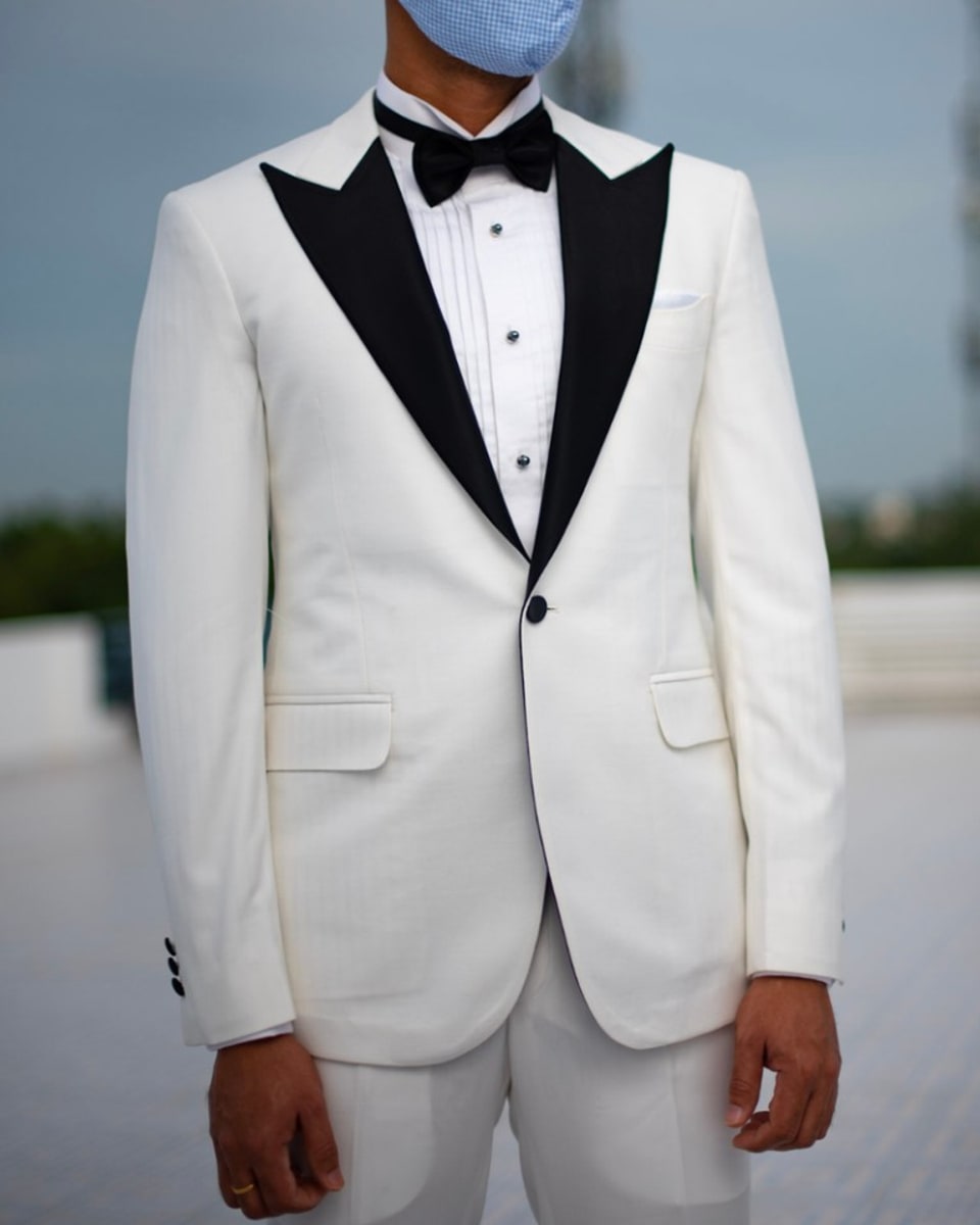 Perfect Attire white tuxedo with black lapels